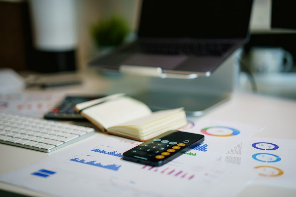Office desk with financial charts representing digital growth