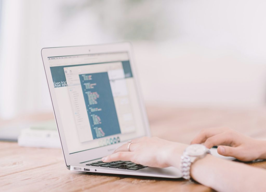 Person planning a holistic digital marketing strategy